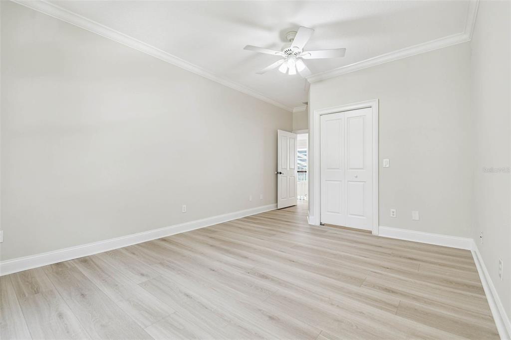 3505 Berger Road Lutz, FL 33548 - Photo 44 of 79 a view of an empty room with wooden floor
