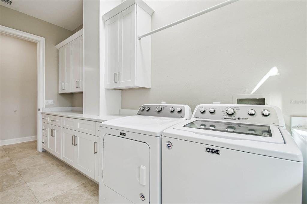 3505 Berger Road Lutz, FL 33548 - Photo 58 of 79 a utility room with dryer and washer