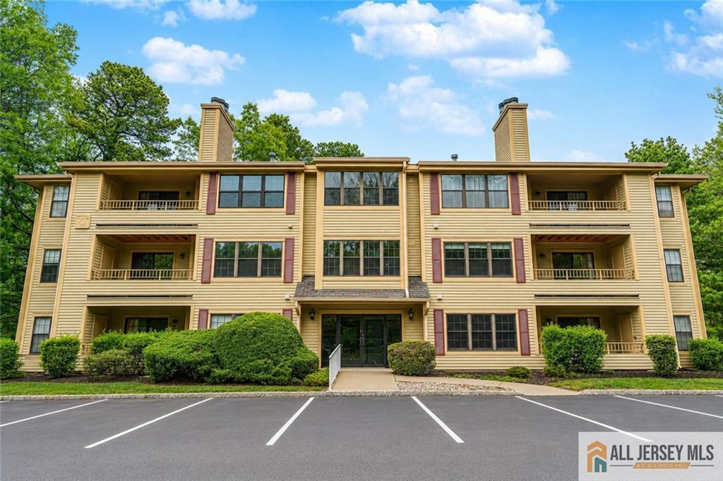 612 Chester Court Helmetta, NJ 08828 - Photo 28 of 31 a front view of a building with garden