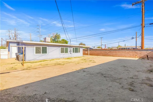 a view of a house with basketball court