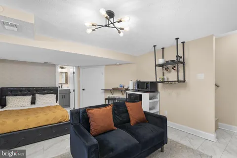 a view of a workspace with furniture