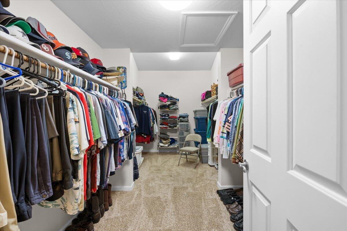 324 China Gulch Road Jacksonville, OR 97530 - Photo 23 of 45 a view of walk in closet with clothes