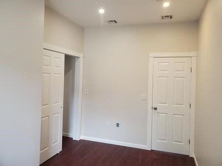 2110 Summit Avenue, Unit 2 Union City, NJ 07087 - Photo 10 of 11 an empty room with wooden floor