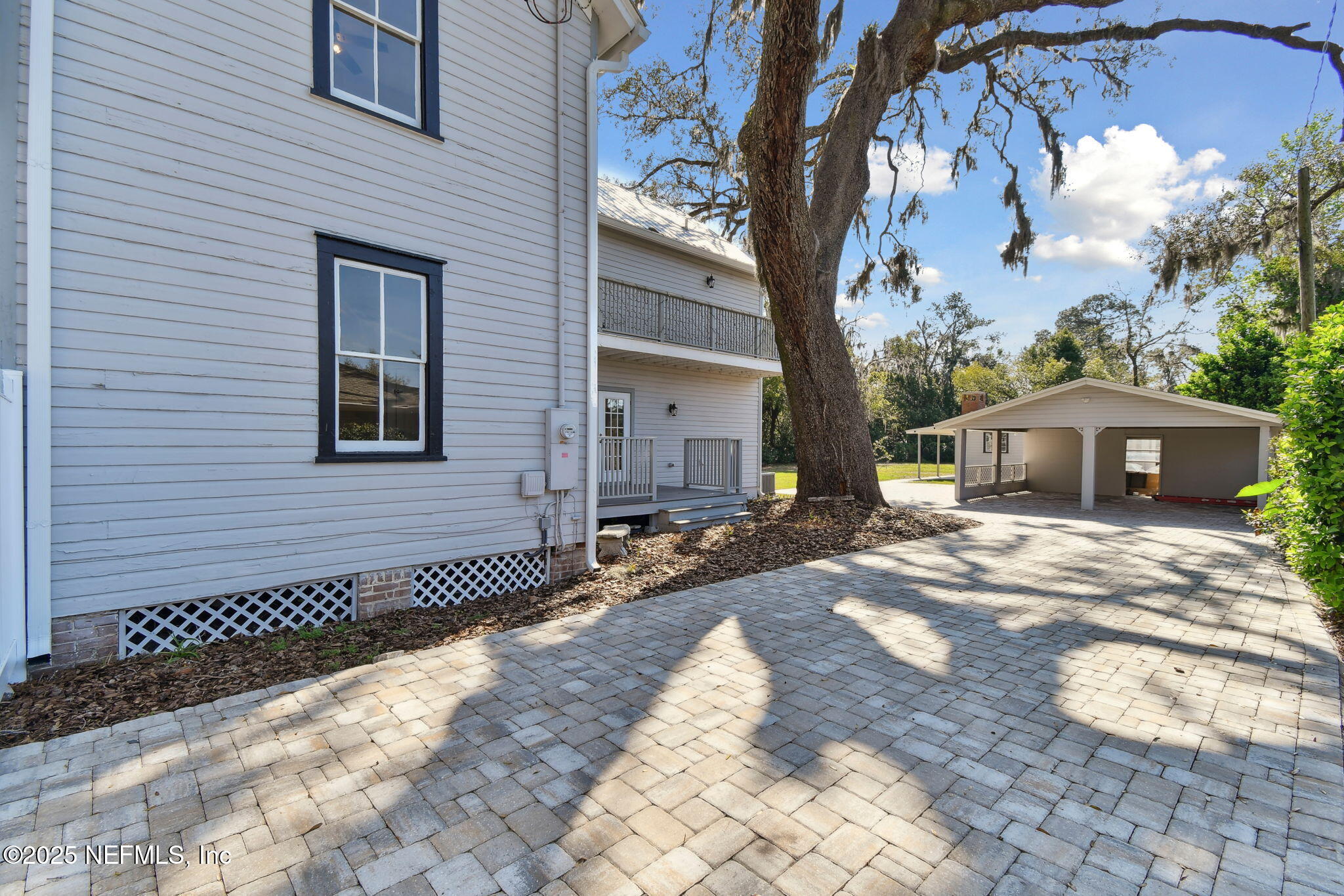 12277 Mandarin Road Jacksonville, FL 32223 - Photo 30 of 74 a front view of a house with a yard