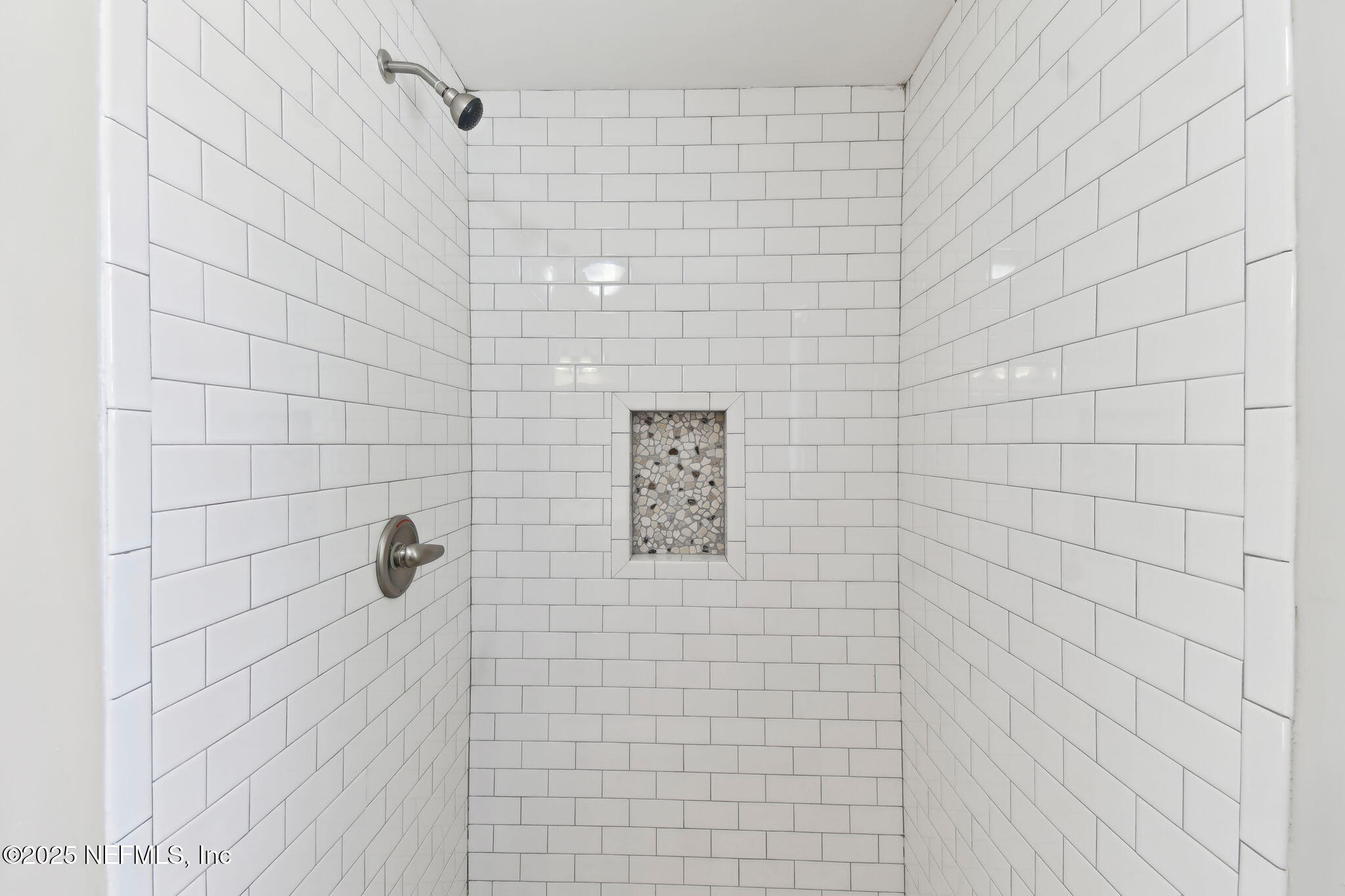 12277 Mandarin Road Jacksonville, FL 32223 - Photo 36 of 74 a bathroom with a shower