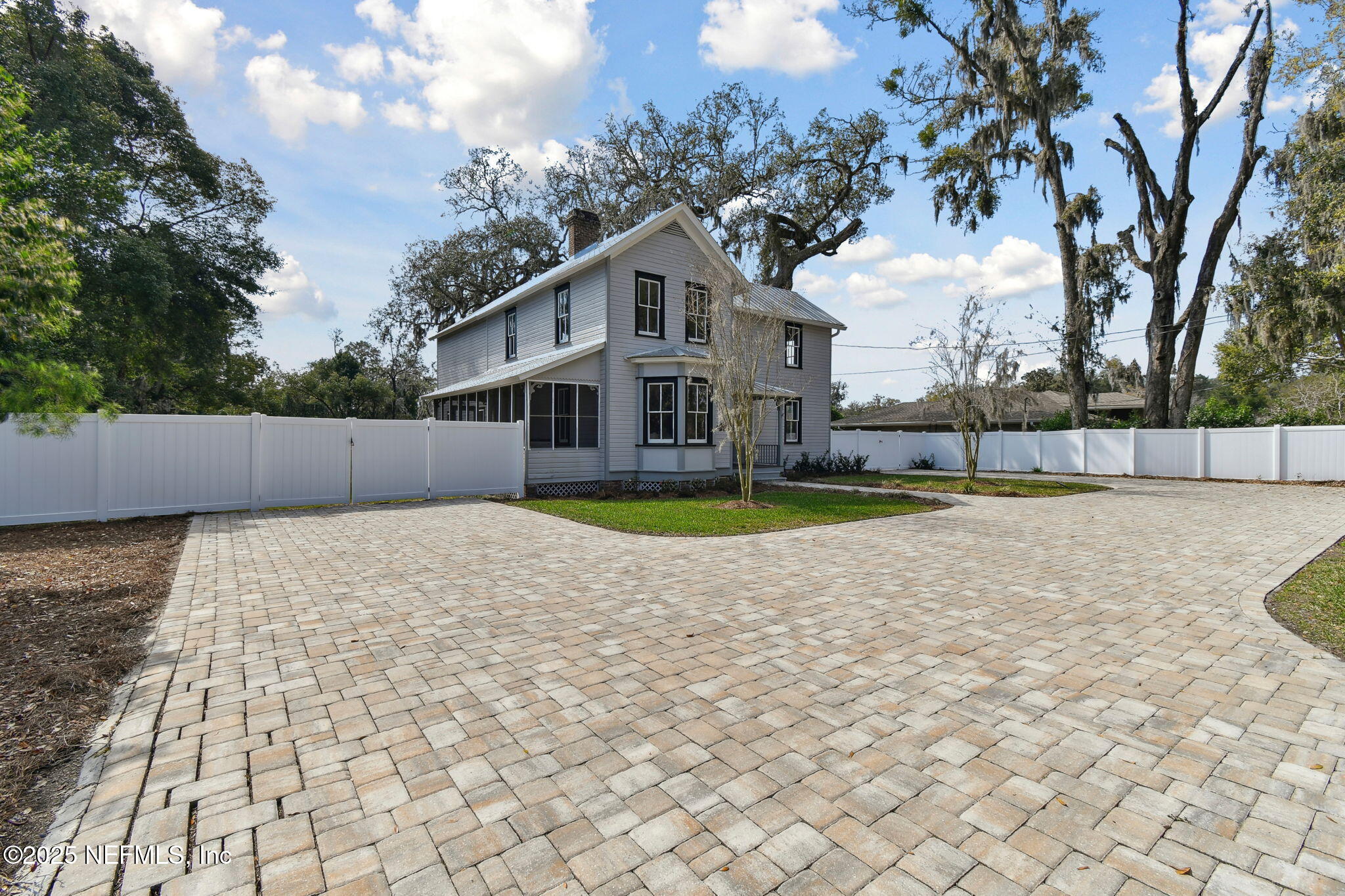 12277 Mandarin Road Jacksonville, FL 32223 - Photo 69 of 74 a house with trees in the background