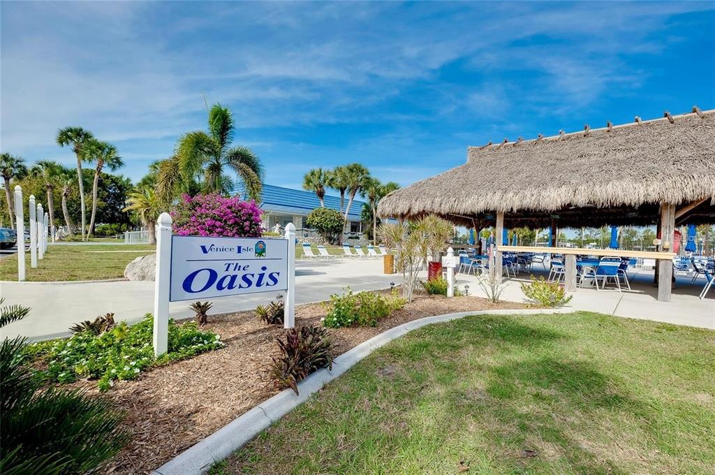 706 Roma Road Venice, FL 34285 - Photo 14 of 24 a view of a park with sitting area