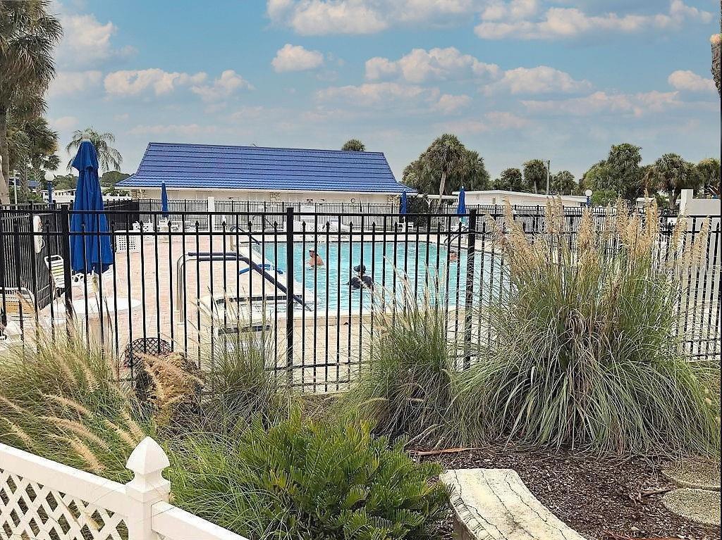 706 Roma Road Venice, FL 34285 - Photo 20 of 24 a view of a houses with a yard