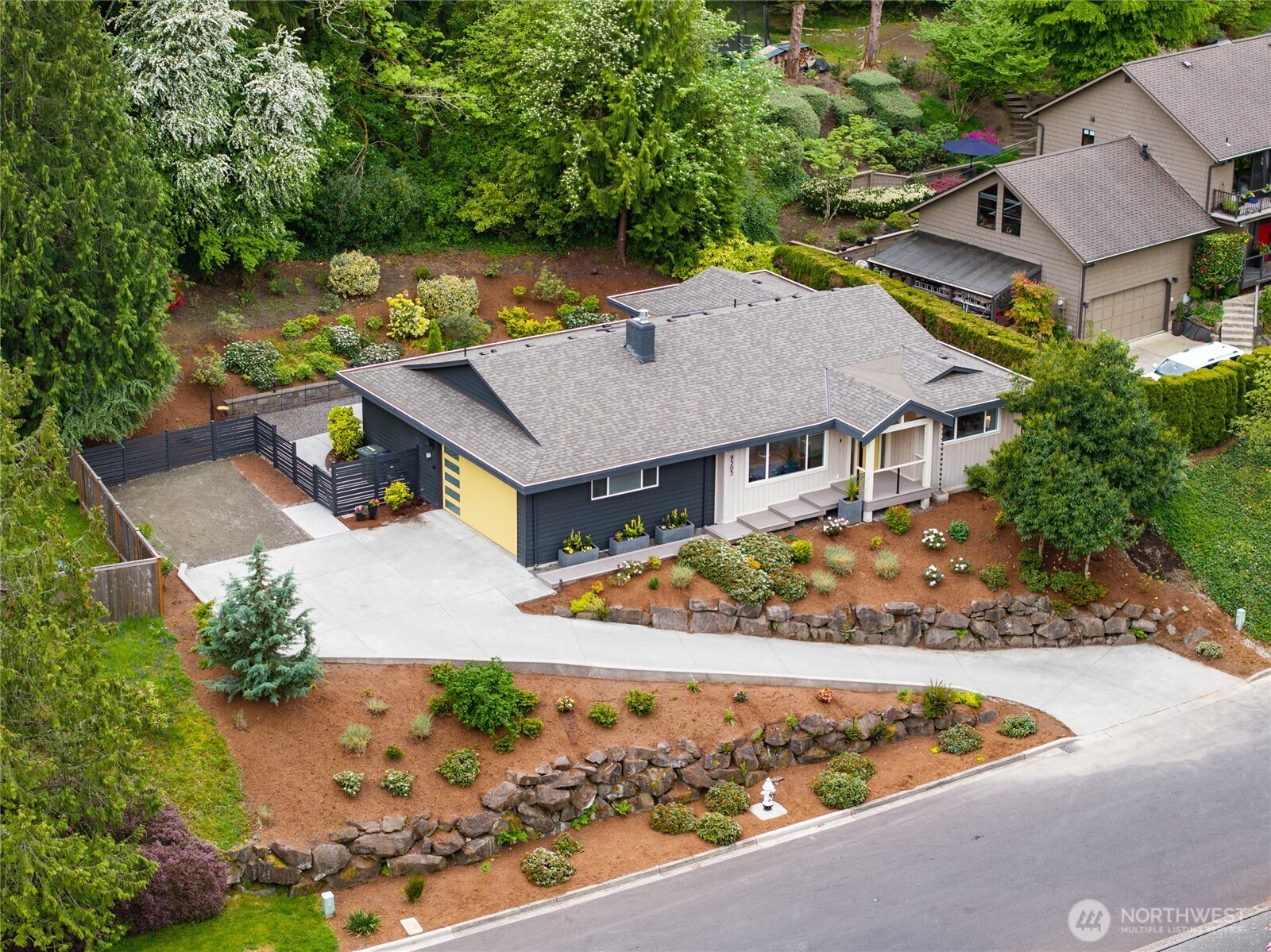 9503 Odin Way Bothell, WA 98011 - Photo 33 of 39 an aerial view of a house with a yard basket ball court and outdoor seating