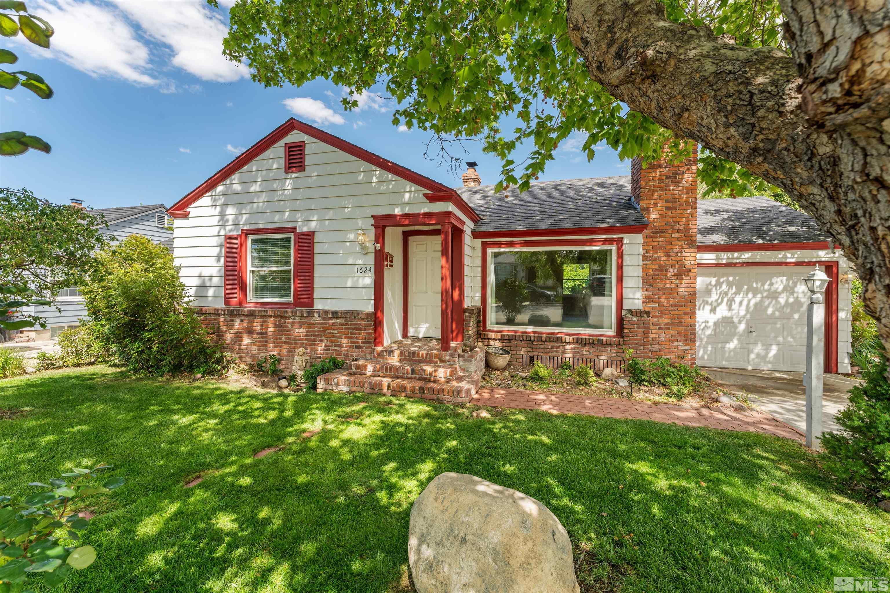 1624 Watt Street Reno, NV 89509 - Photo 1 of 40 a front view of house with a garden
