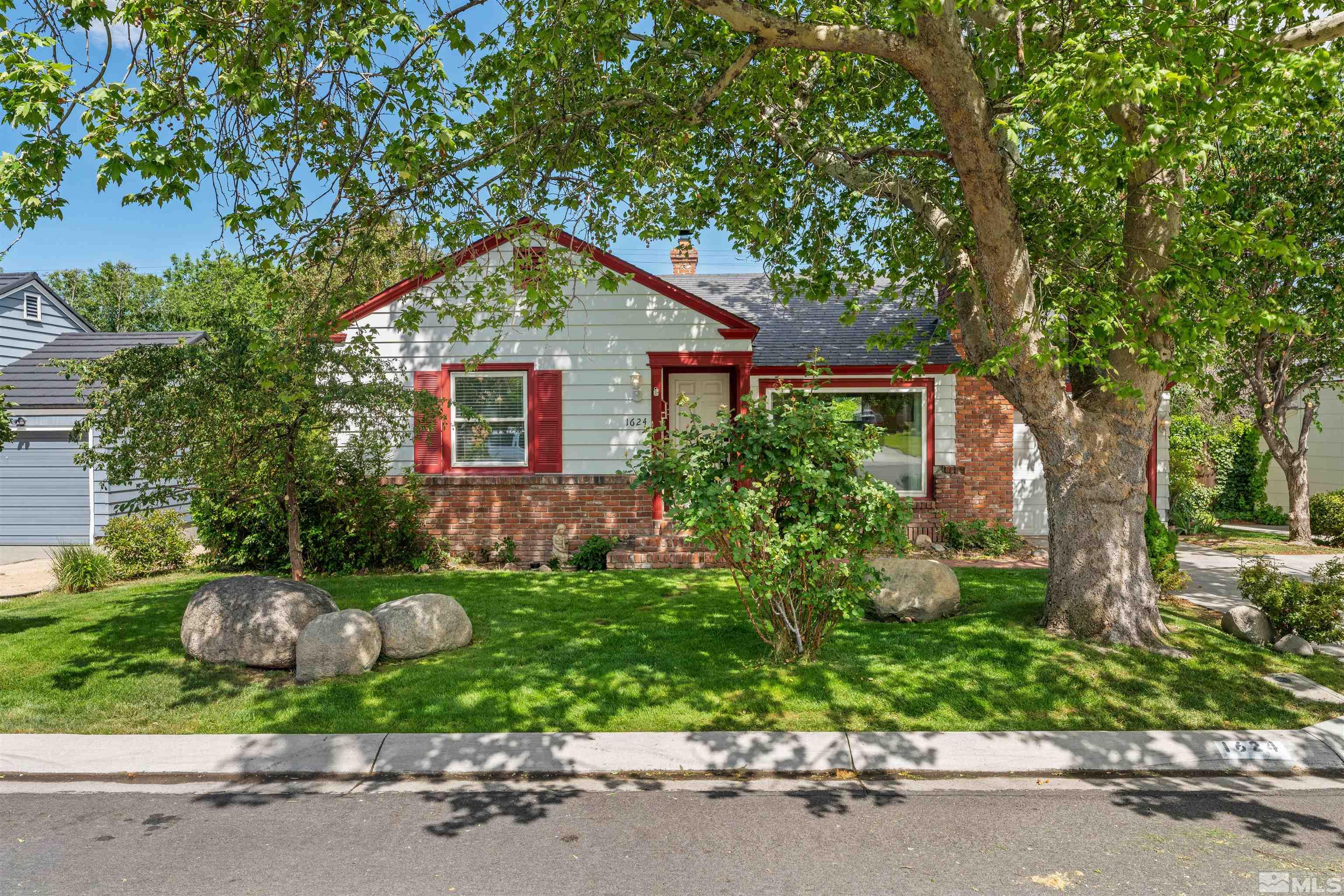 1624 Watt Street Reno, NV 89509 - Photo 2 of 40 front view of a house with a small yard