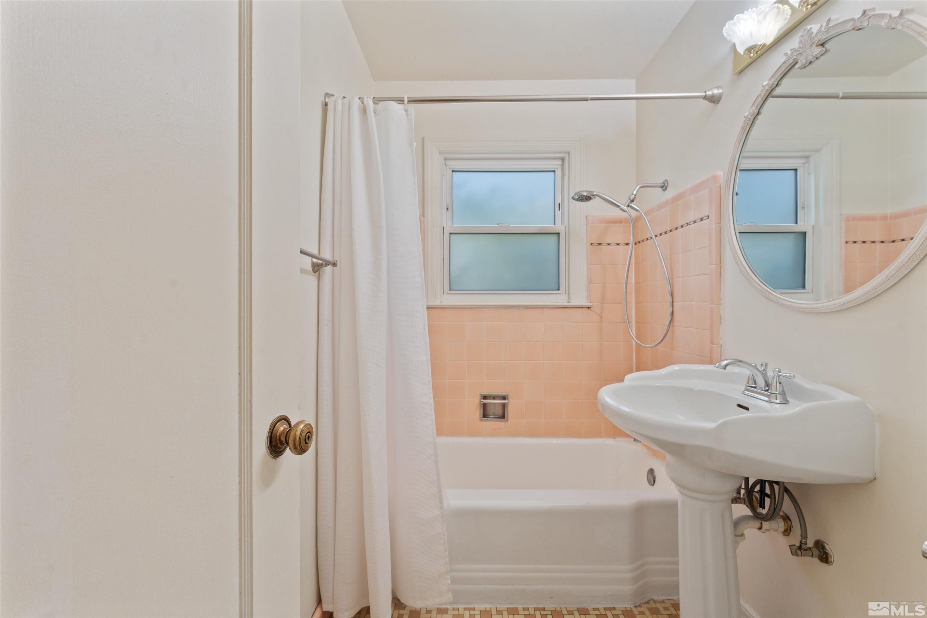 1624 Watt Street Reno, NV 89509 - Photo 22 of 40 a bathroom with a sink a toilet and shower