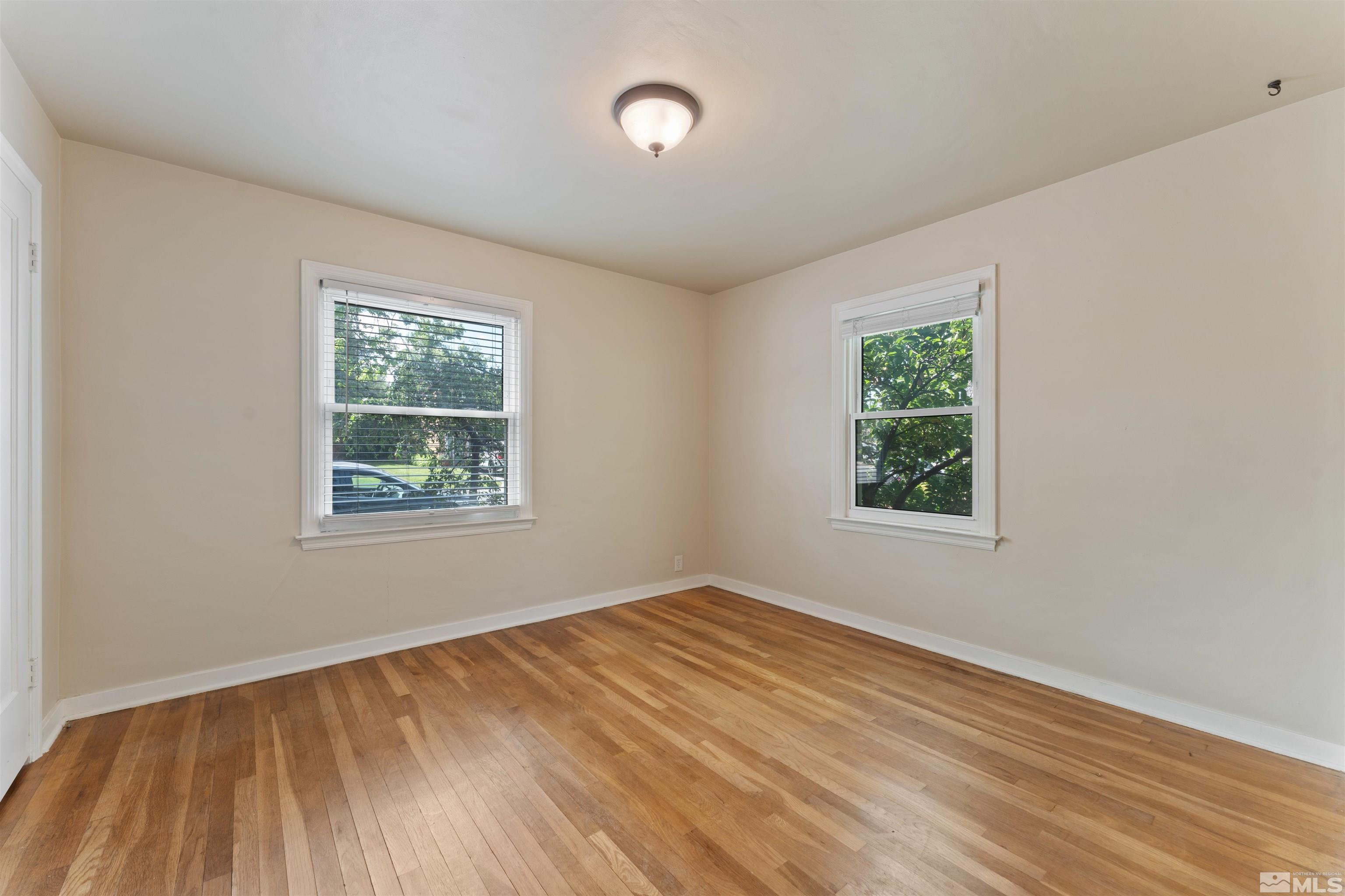 1624 Watt Street Reno, NV 89509 - Photo 24 of 40 an empty room with windows