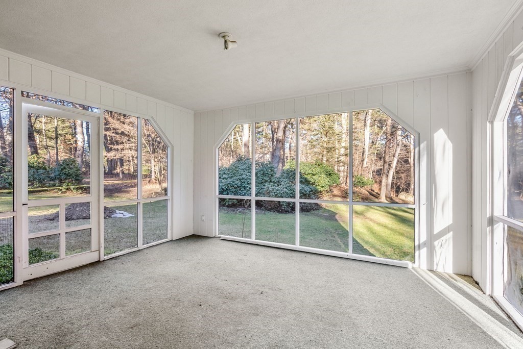140 Cherry Brook Road Weston, MA 02493 - Photo 19 of 32 a view of an empty room with a large window