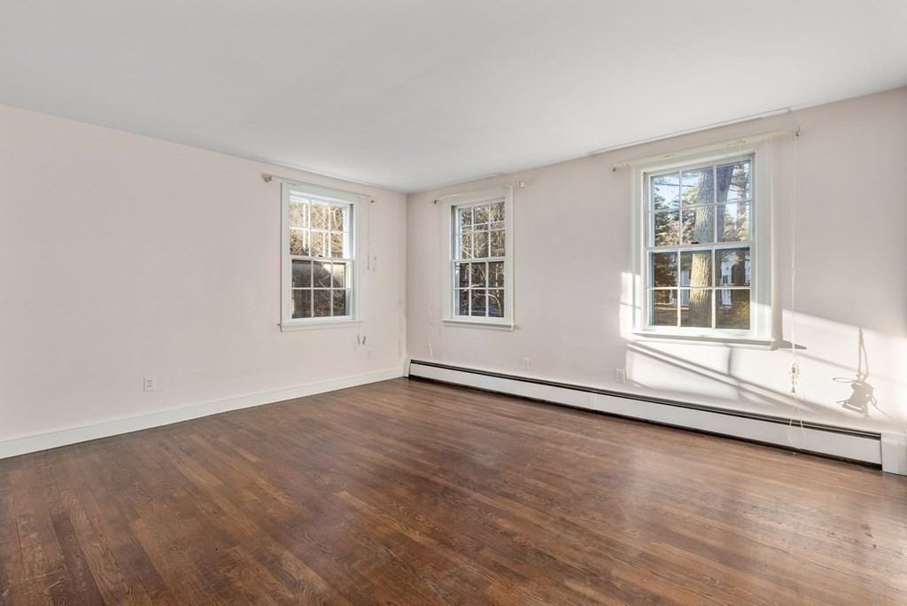 140 Cherry Brook Road Weston, MA 02493 - Photo 28 of 32 a view of an empty room with wooden floor and a window