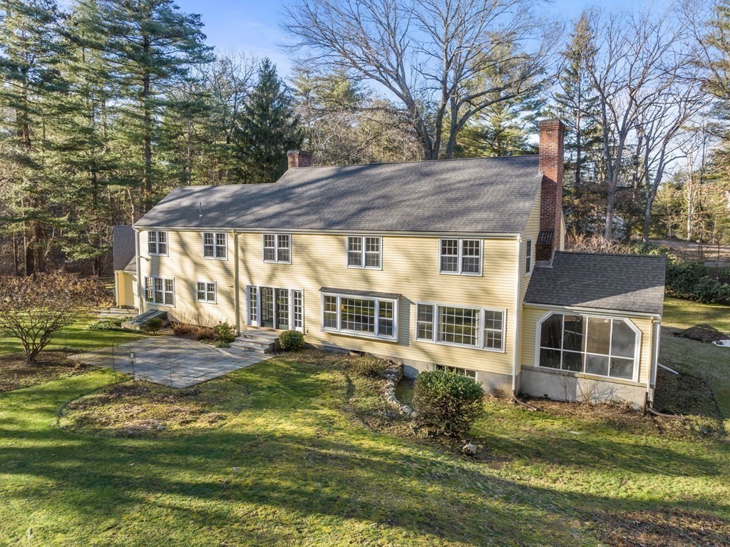 140 Cherry Brook Road Weston, MA 02493 - Photo 3 of 32 a view of a house with a yard