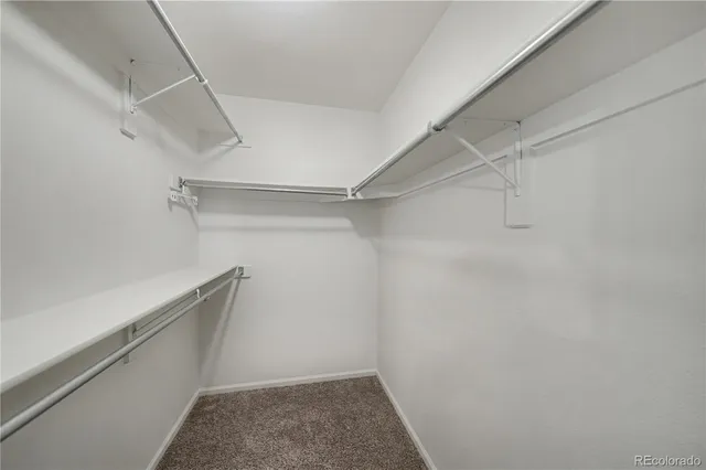 a view of an empty walk in closet