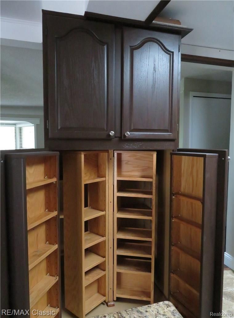 1967 East Commerce Road Commerce Township, MI 48382 - Photo 9 of 33 Big pantry cabinet