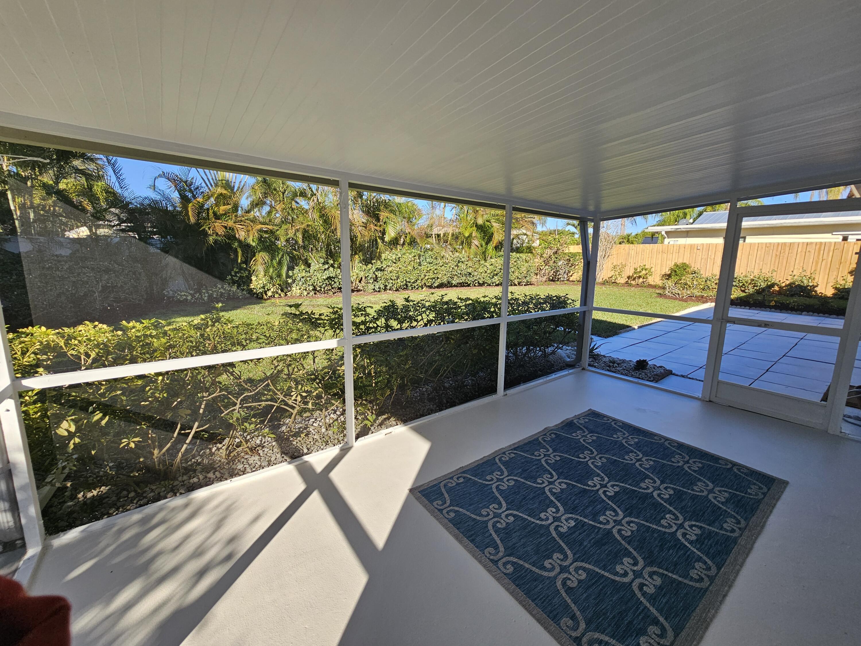 355 Franklin Road Tequesta, FL 33469 - Photo 29 of 33 Large rear screened patio