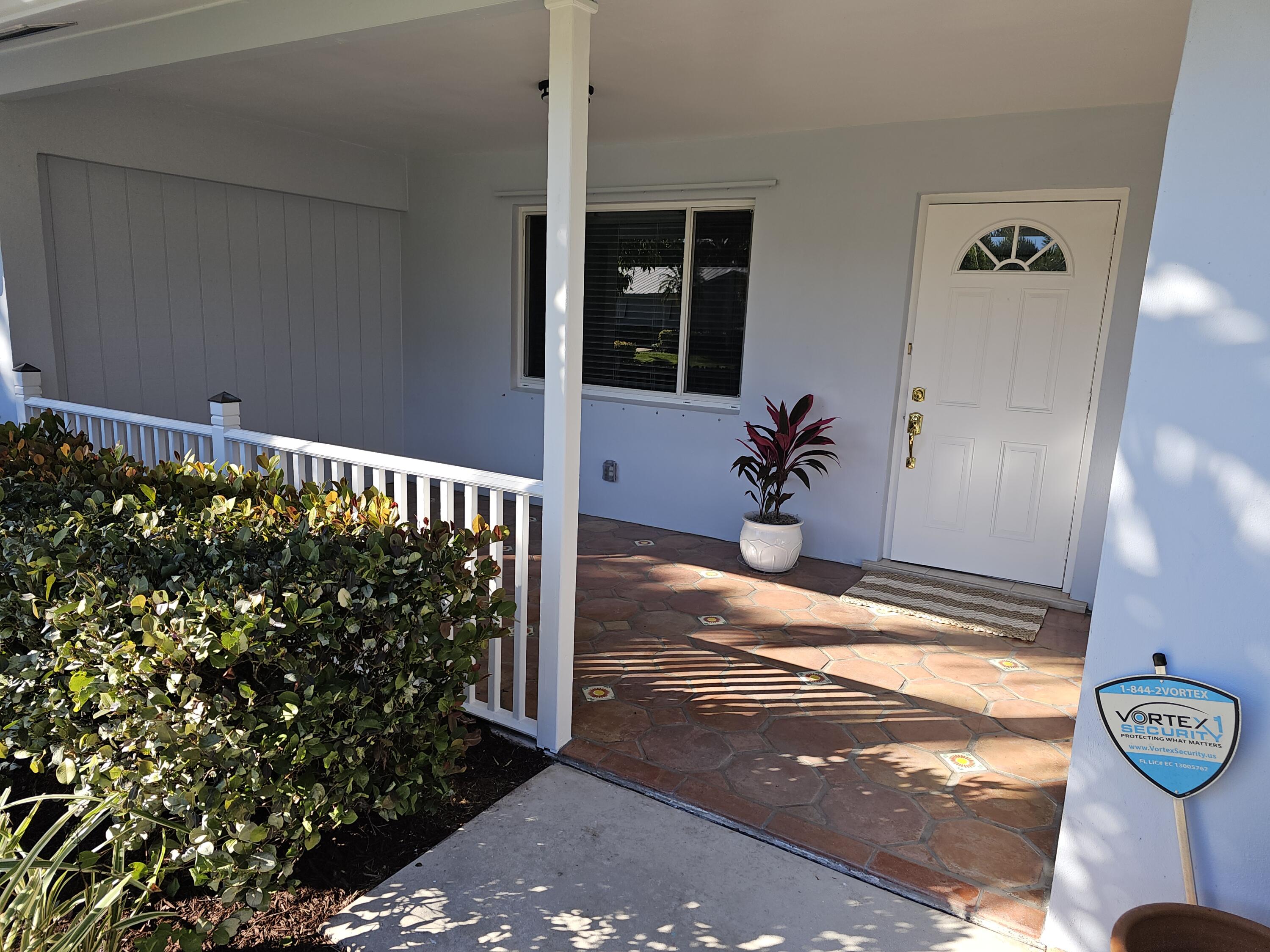 355 Franklin Road Tequesta, FL 33469 - Photo 6 of 33 Front entrance