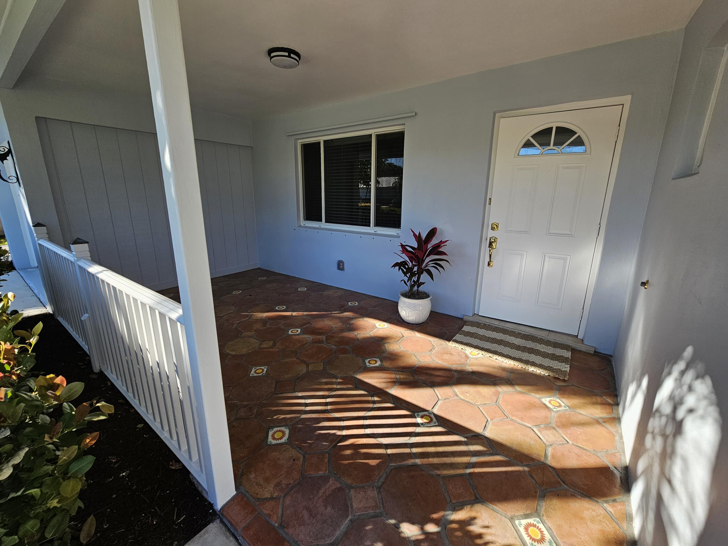 355 Franklin Road Tequesta, FL 33469 - Photo 7 of 33 Spacious front porch