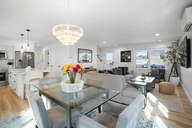 a living room with furniture and window