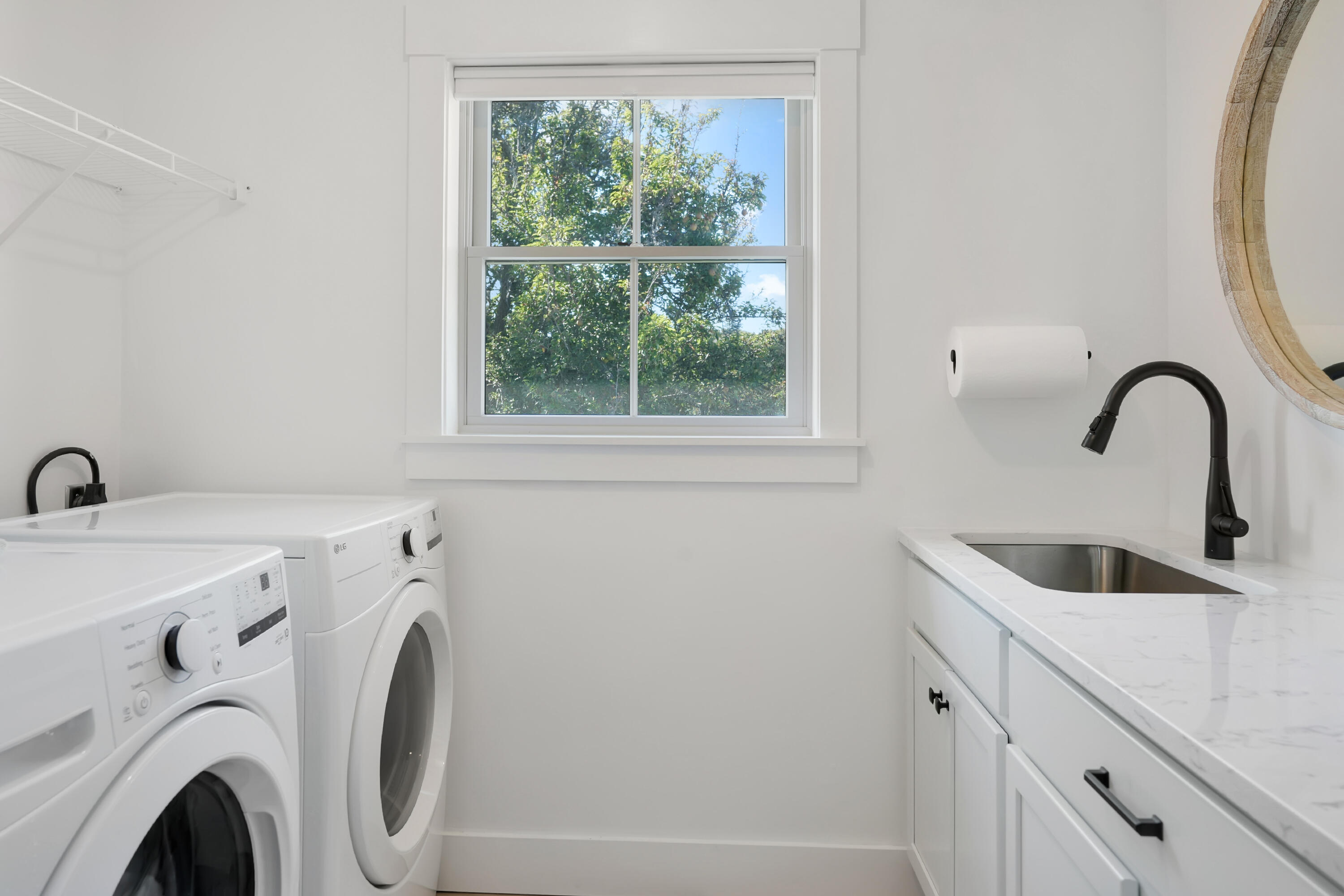 33 Lagoon Pond Road Vineyard Haven, MA 02568 - Photo 28 of 42 a utility room with dryer and washer