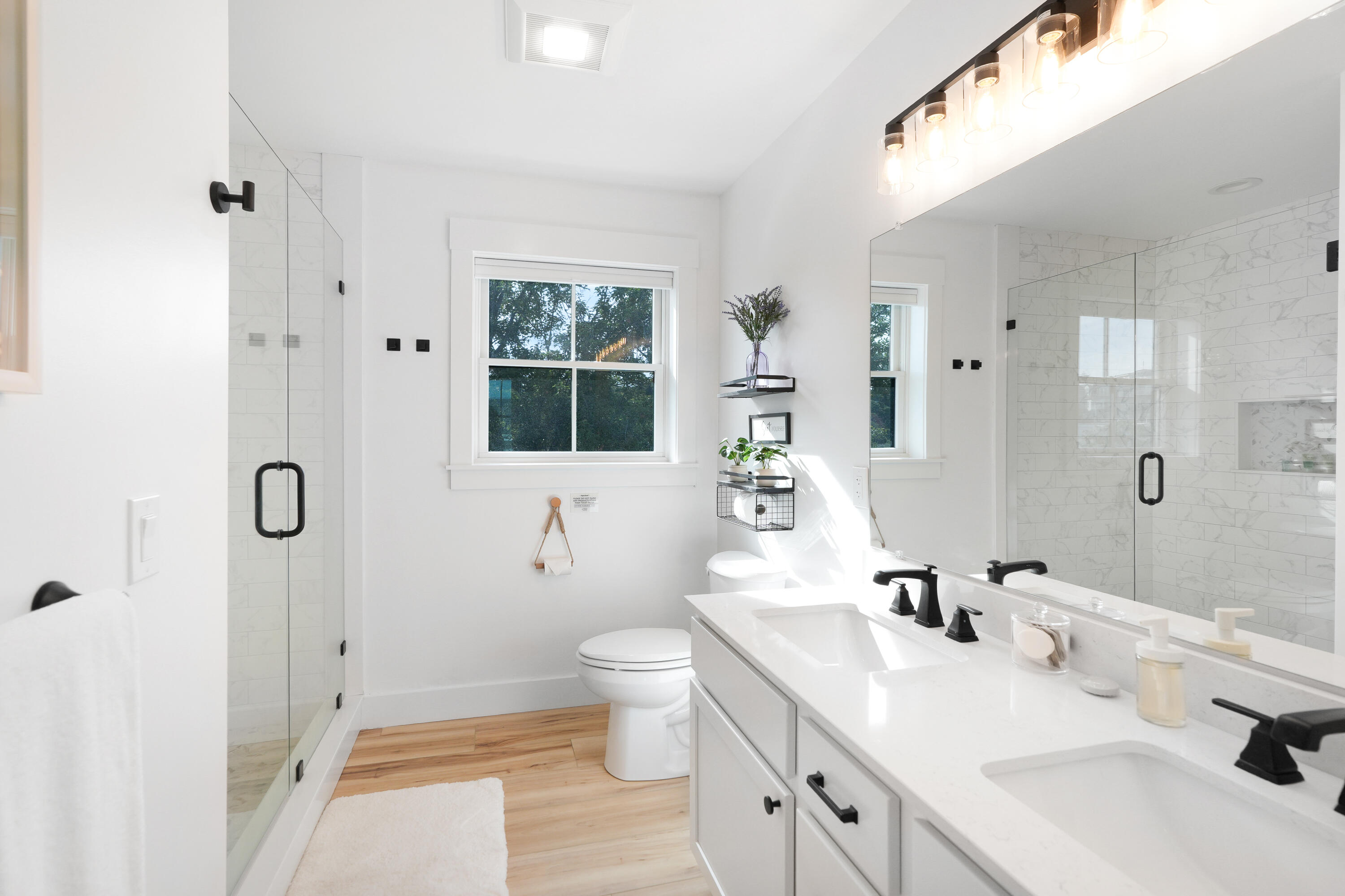 33 Lagoon Pond Road Vineyard Haven, MA 02568 - Photo 34 of 42 a bathroom with a sink toilet and shower