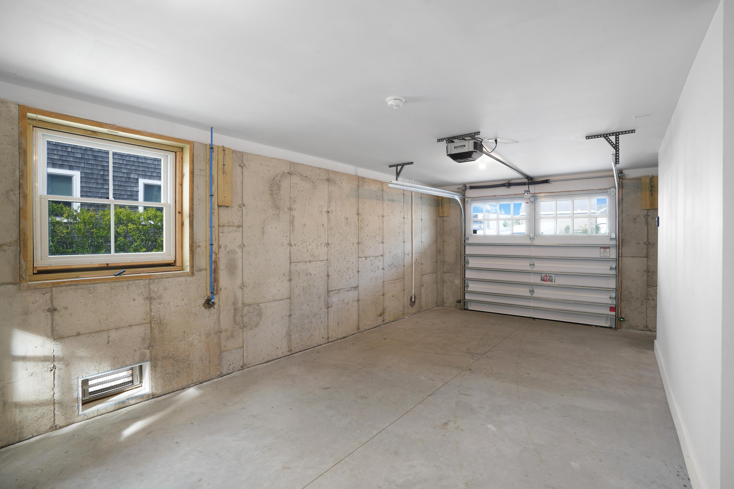 33 Lagoon Pond Road Vineyard Haven, MA 02568 - Photo 36 of 42 a view of empty room with windows