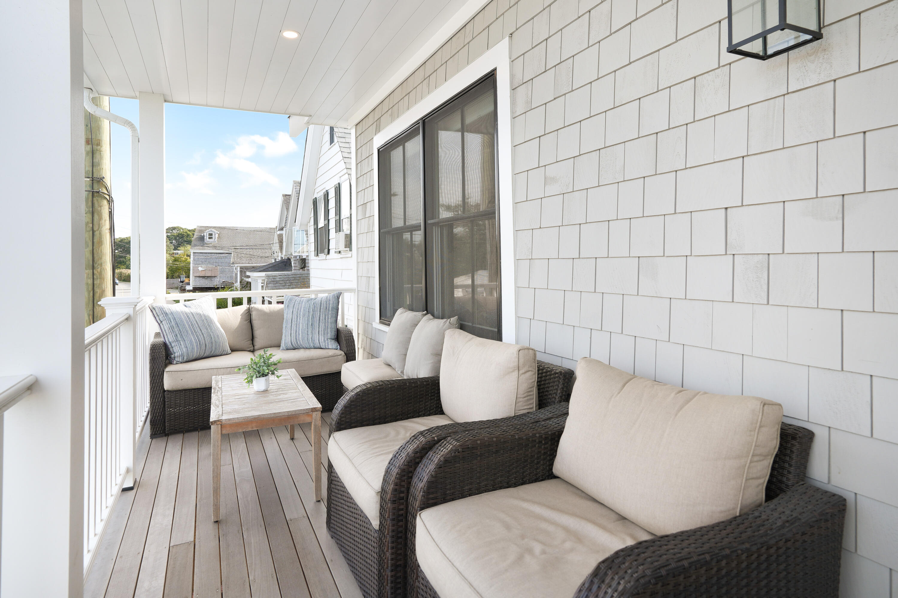 33 Lagoon Pond Road Vineyard Haven, MA 02568 - Photo 6 of 42 a living room with furniture and a large window