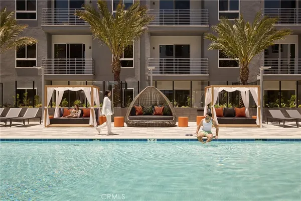 a view of pool with outdoor seating