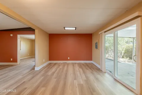 a kitchen with stainless steel appliances a stove a sink and a refrigerator