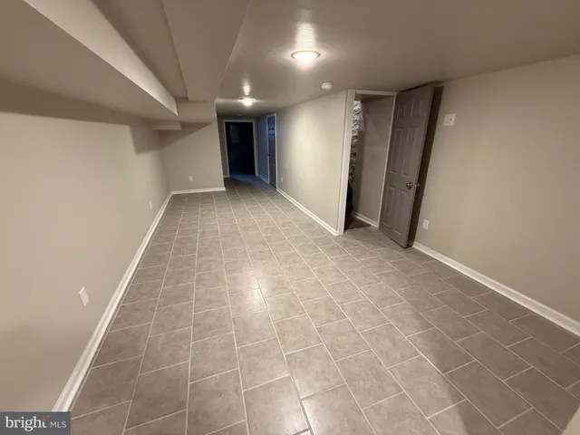 a view of hallway with a window