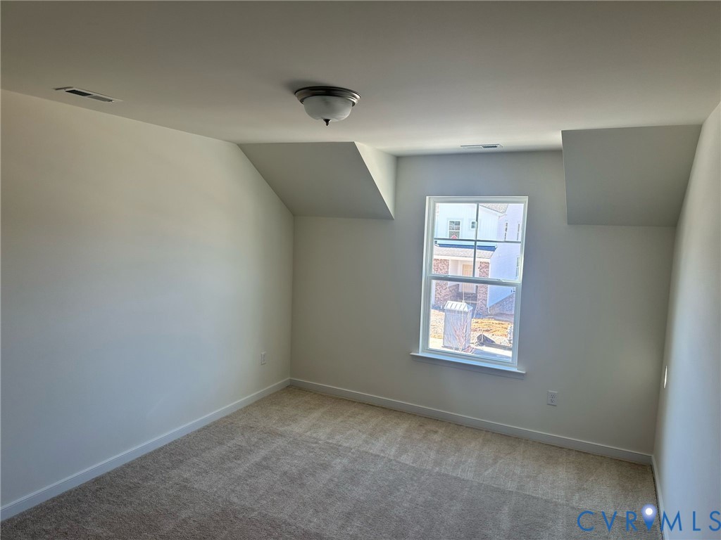 12737 Deep Wl Road Midlothian, VA 23112 - Photo 12 of 17 an empty room with windows
