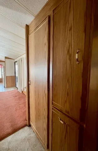 a view of a bathroom with a glass door