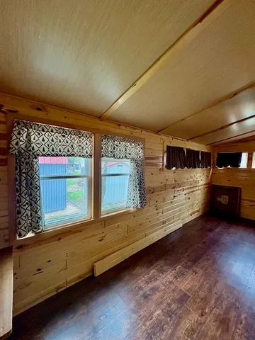 a view of front door with washer and dryer
