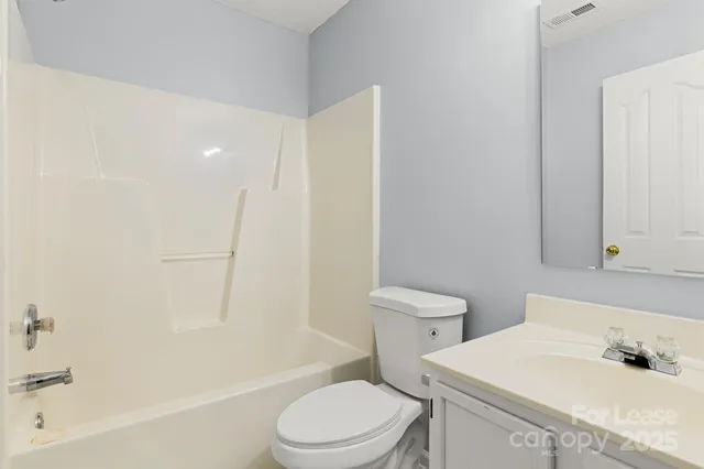 front view of a house and a yard