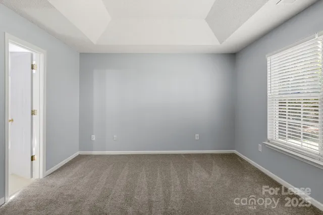 a view of a room that has a window in it