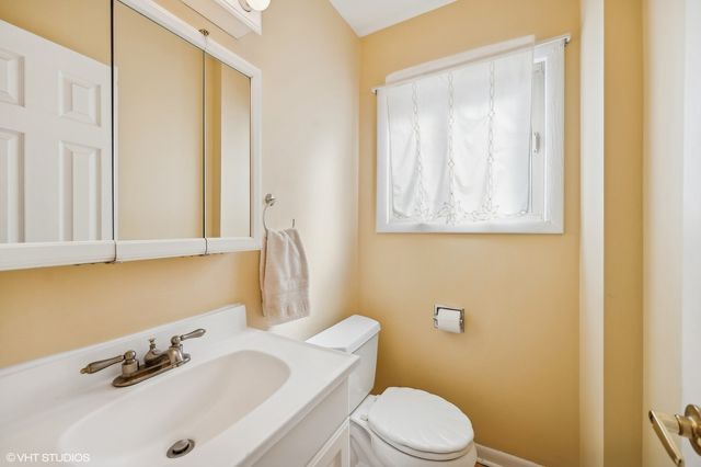 a bathroom with a sink and a toilet