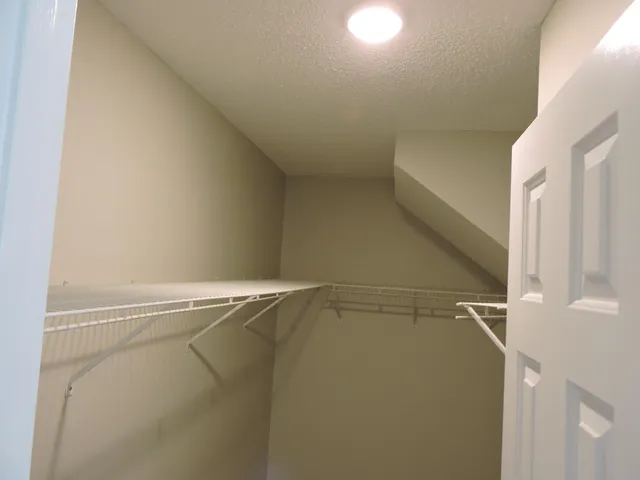 a view of a room with racks on the wall