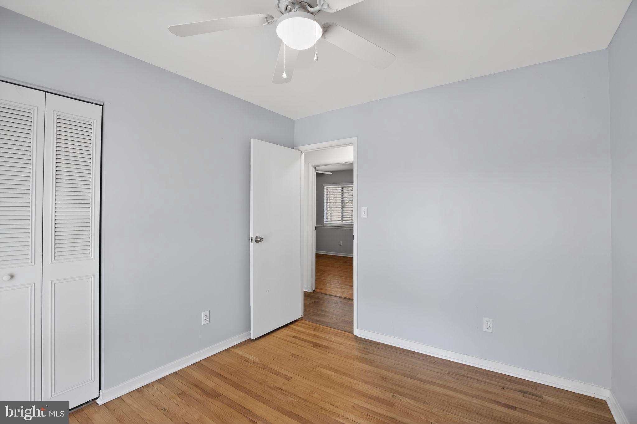 9276 Soaring Hill Road Columbia, MD 21045 - Photo 13 of 27 a view of an empty room with wooden floor