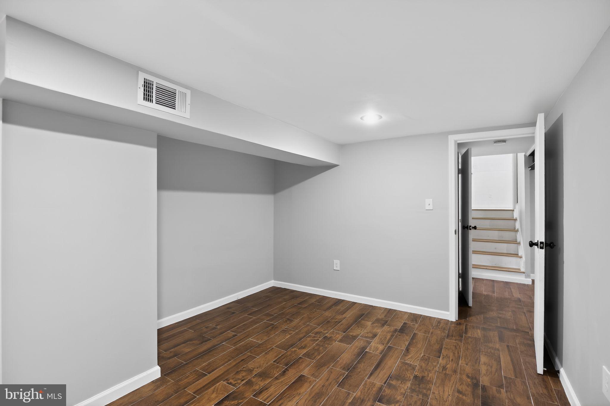 9276 Soaring Hill Road Columbia, MD 21045 - Photo 22 of 27 wooden floor in an empty room