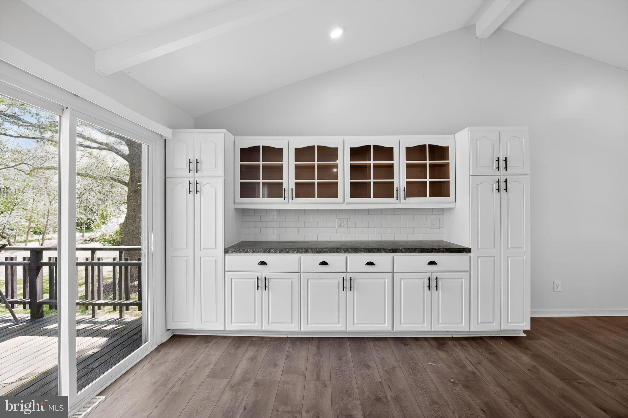 9276 Soaring Hill Road Columbia, MD 21045 - Photo 8 of 27 a view of kitchen with wooden cabinet