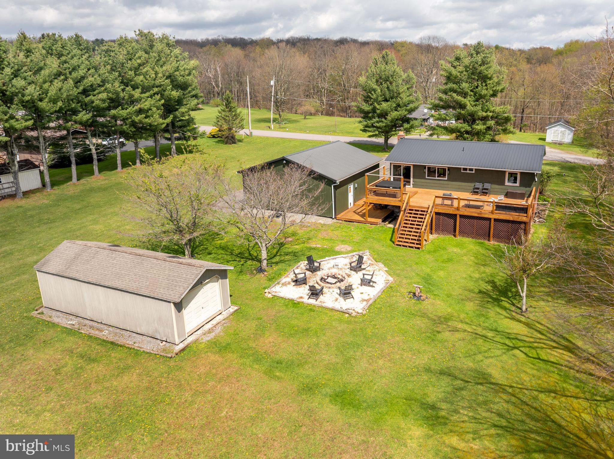 1015 Pysell Road McHenry, MD 21541 - Photo 51 of 56 a view of a house with yard and lake view