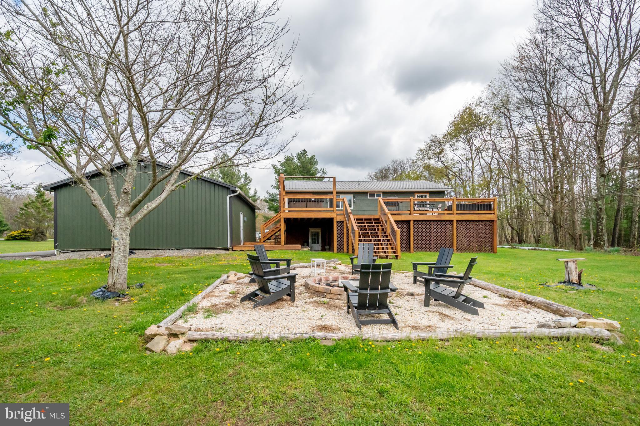 1015 Pysell Road McHenry, MD 21541 - Photo 53 of 56 a view of backyard of house with outdoor seating and green space