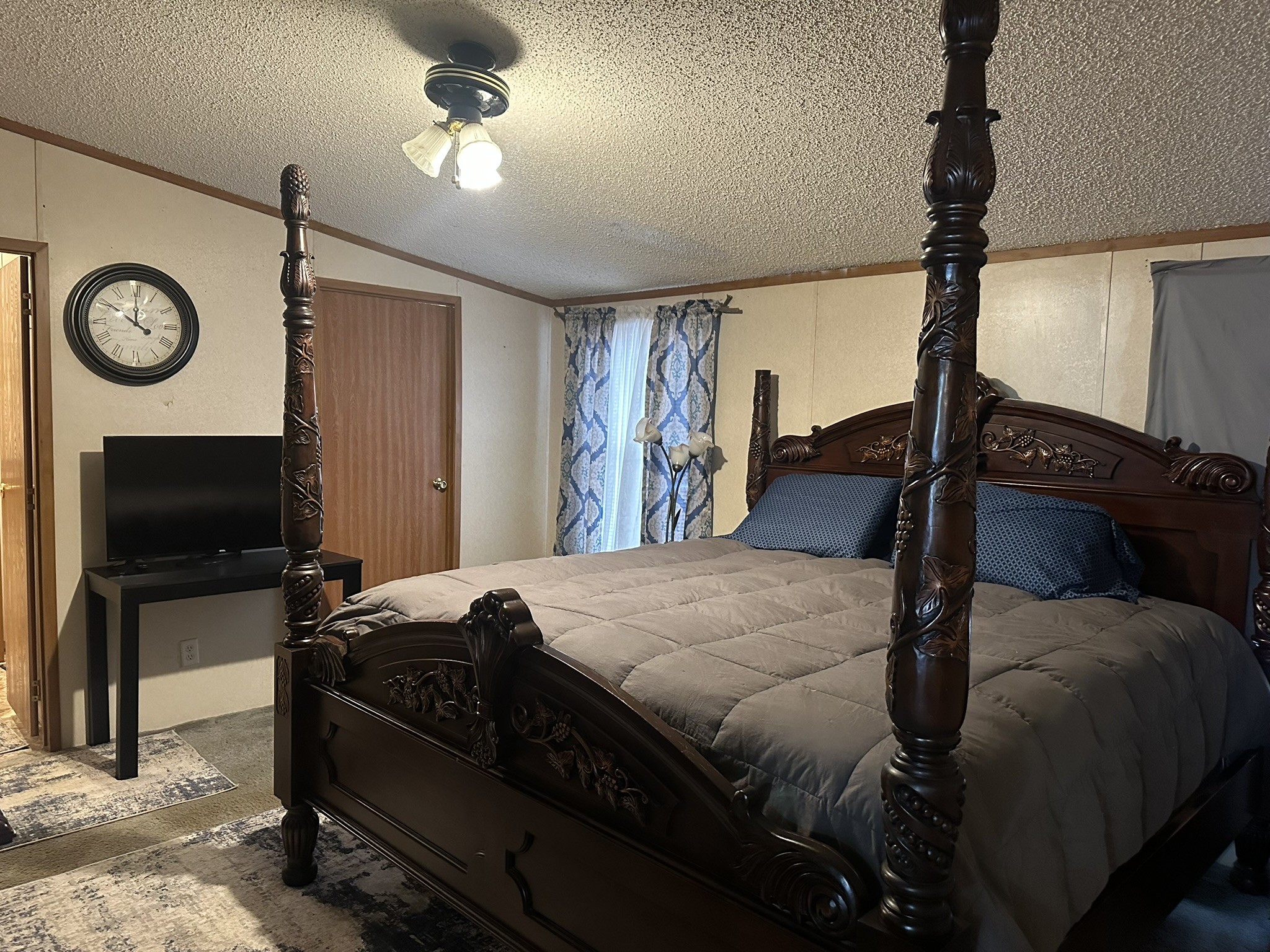 69 Buck Ridge Road Graysville, TN 37338 - Photo 22 of 38 Master bedroom; walk-in closet to the left, bathroom entrance to the right