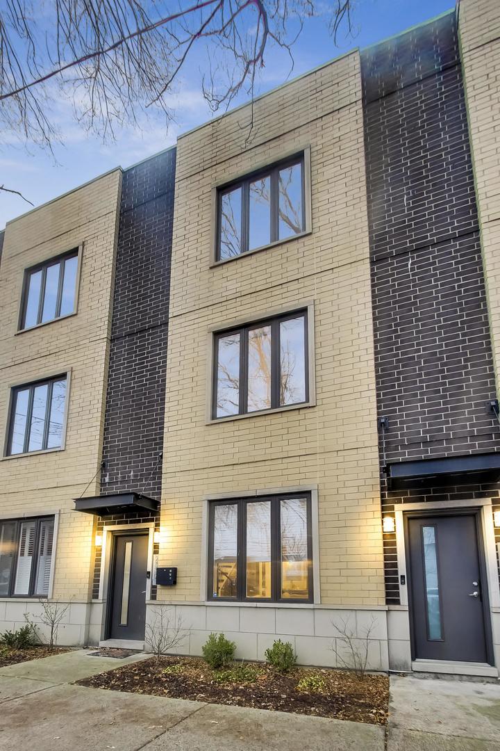 2339 North Drake Avenue Chicago, IL 60647 - Photo 2 of 29 a front view of a house