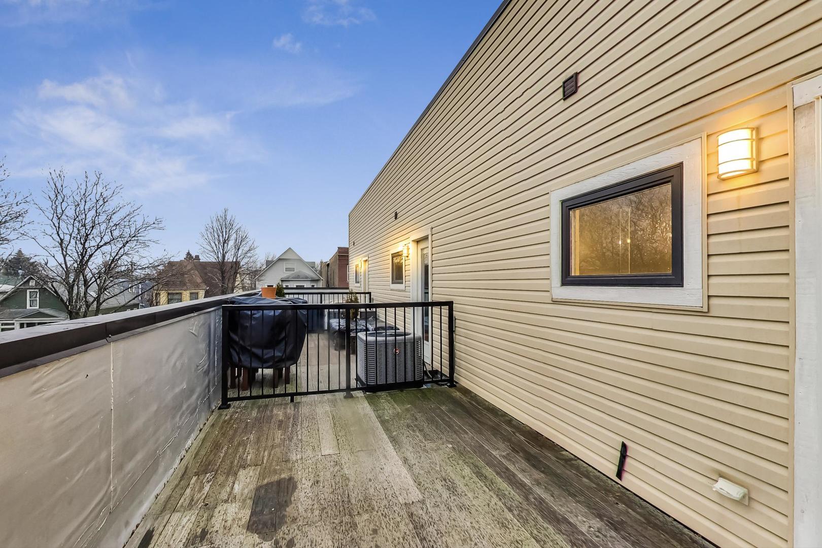 2339 North Drake Avenue Chicago, IL 60647 - Photo 26 of 29 a view of a terrace with sitting area