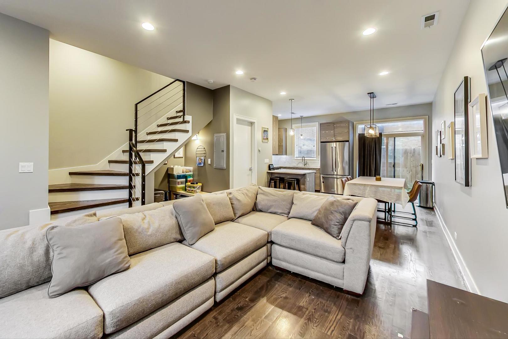 2339 North Drake Avenue Chicago, IL 60647 - Photo 4 of 29 a living room with furniture and a wooden floor