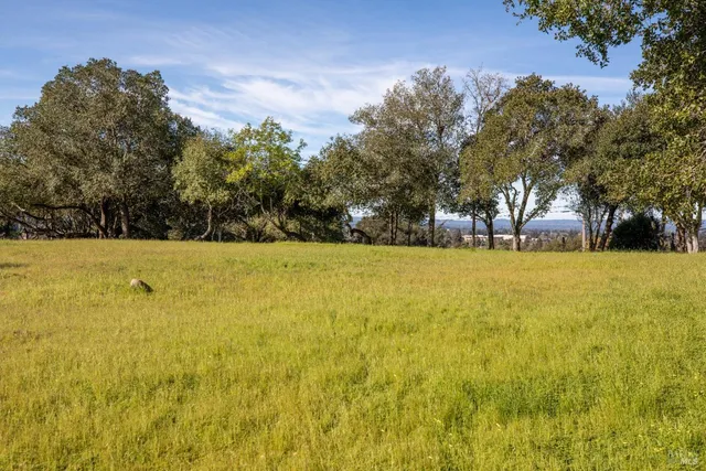 a view of swimming pool with an outdoor space and seating area